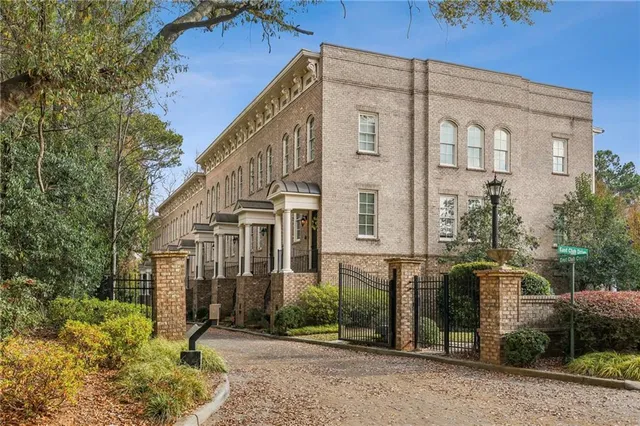 front view of a building with a yard