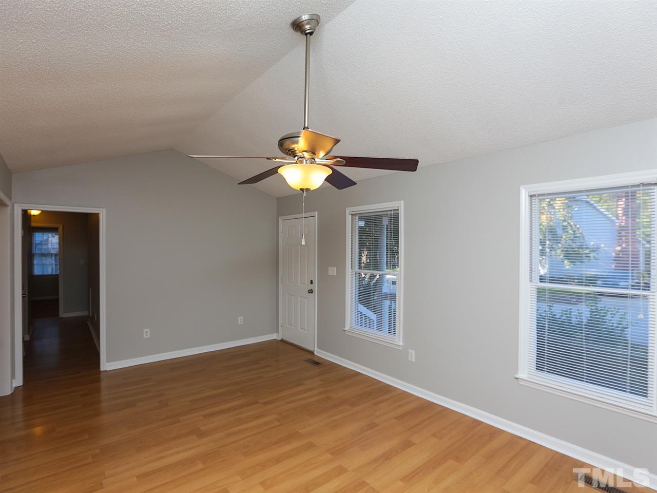 3537 East Jameson Road Raleigh, NC 27604 - Photo 8 of 17 a view of a room with a window and wooden floor