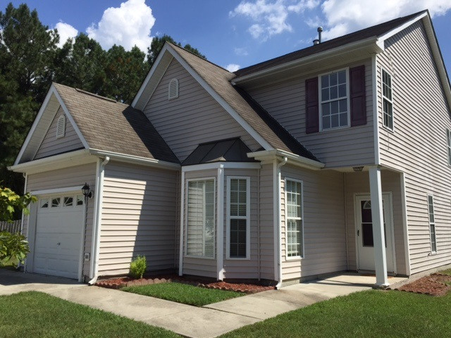 302 Burrell Road Durham, NC 27703 - Photo 2 of 15 One car garage with additional parking pad. Features