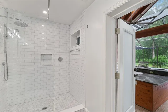 a kitchen with a sink and large window