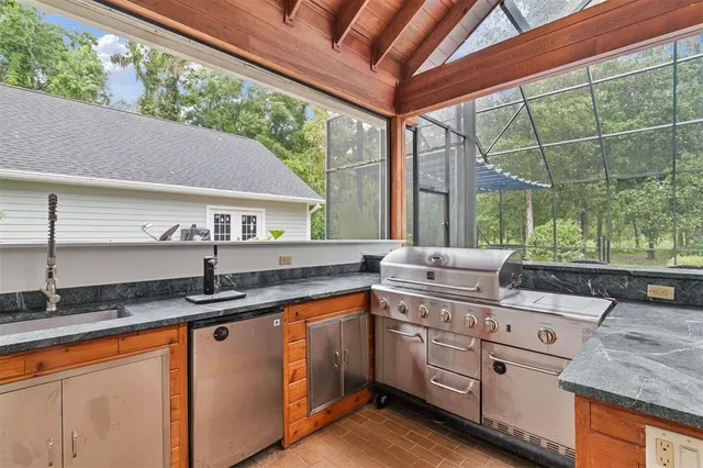 a bathroom with a sink tub double vanity and mirror