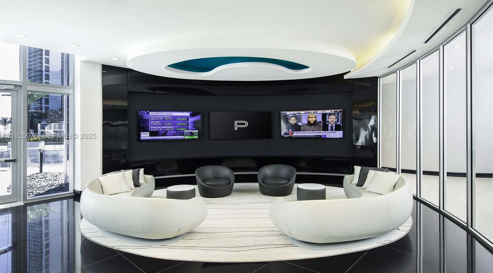 851 Northeast 1st Avenue, Unit 3810 Miami, FL 33132 - Photo 17 of 32 a living room with furniture a rug and a floor to ceiling window