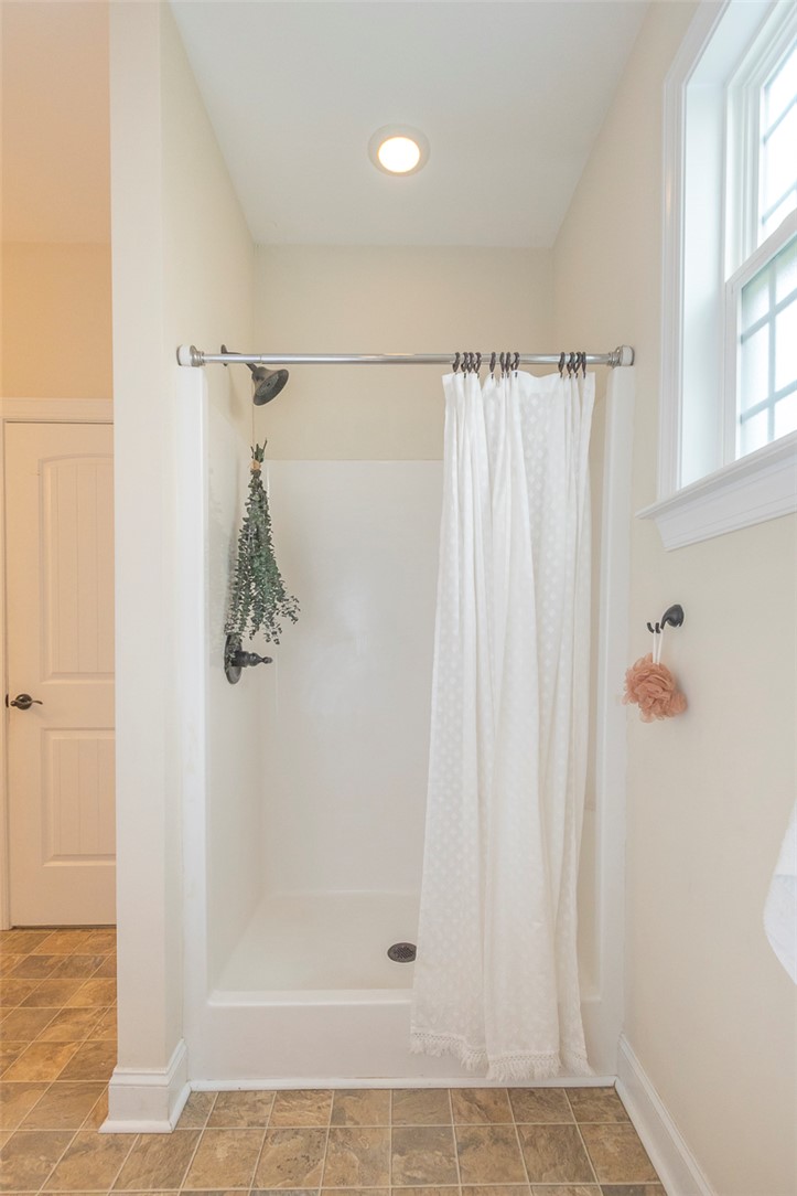 234 Streams Way Anderson, SC 29625 - Photo 30 of 44 This bathroom features a walk-in shower and ample natural light.