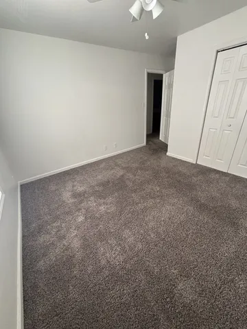 an empty room with a bathroom