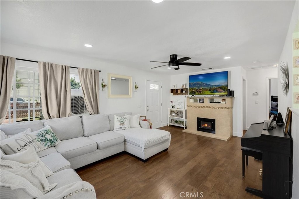 414 South Linden Avenue Rialto, CA 92376 - Photo 16 of 44 Fire in fireplace is virtual home does not have actual built in fireplace.