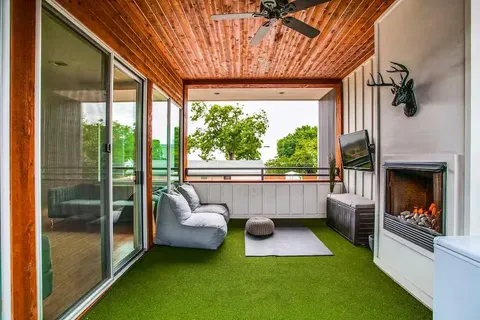 a room with furniture and a fireplace