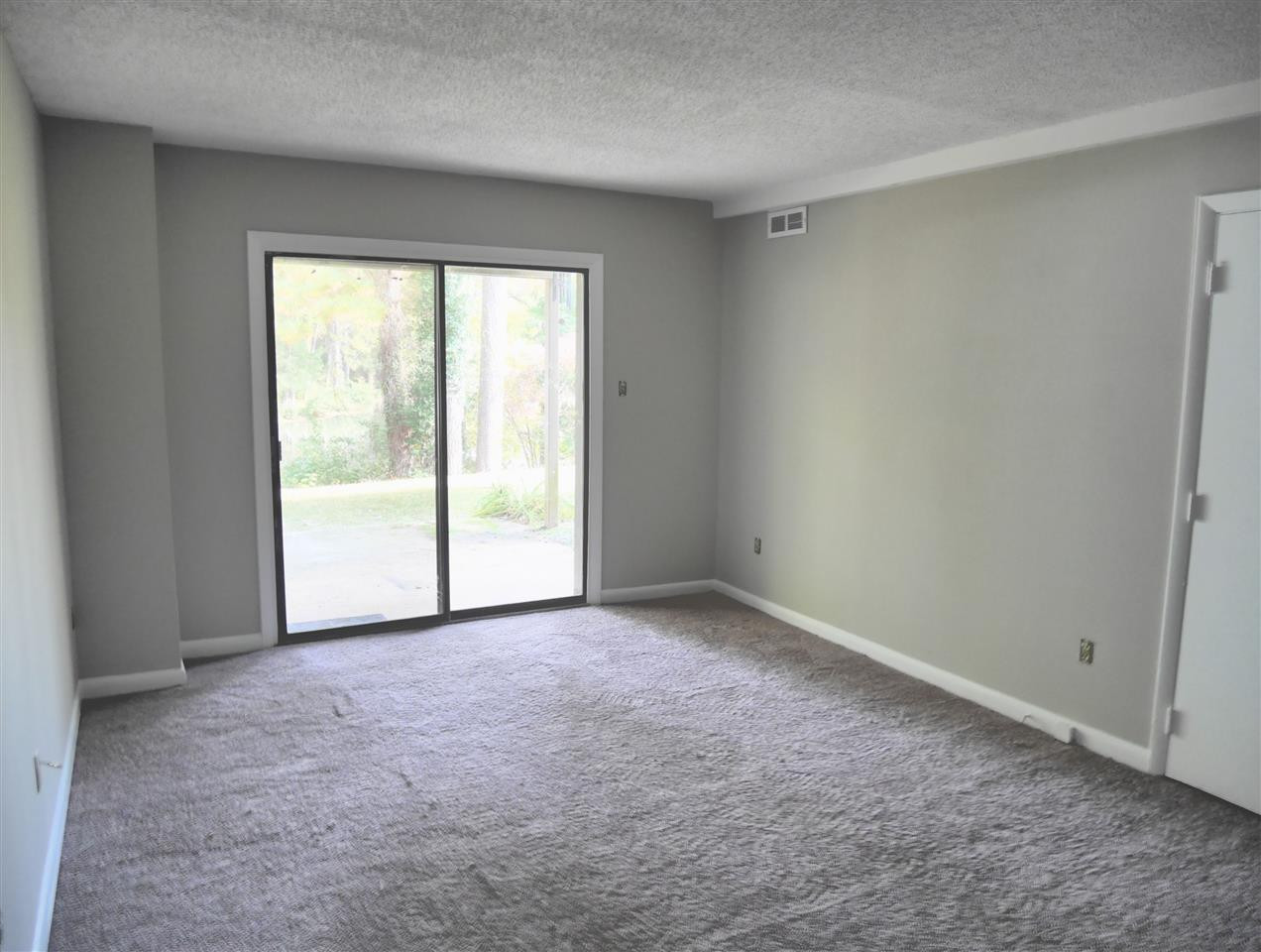5118 Flint Ridge Place, Unit 5118 Raleigh, NC 27609 - Photo 2 of 18 Bright Living Room