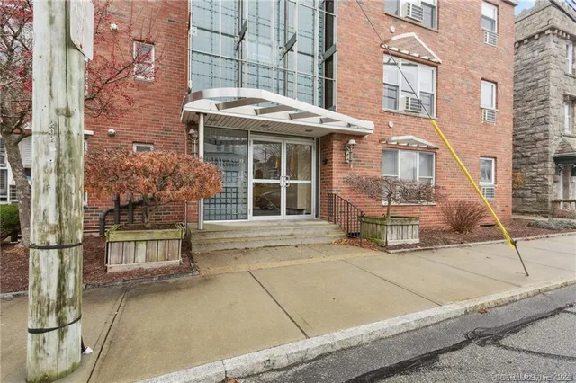 a front view of a building with a glass door