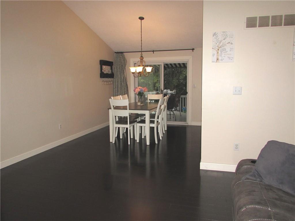 417 Rampart Boulevard New Kensington, PA 15068 - Photo 12 of 39 a dining room with furniture window and wooden floor