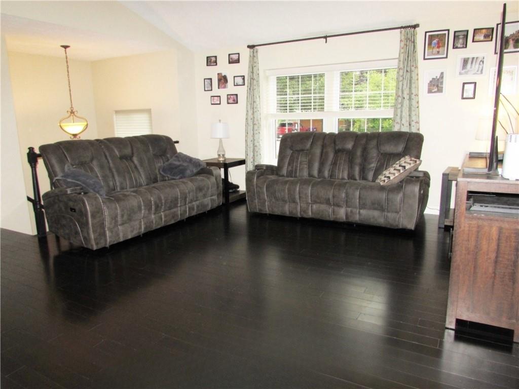 417 Rampart Boulevard New Kensington, PA 15068 - Photo 13 of 39 a living room with furniture and a large window