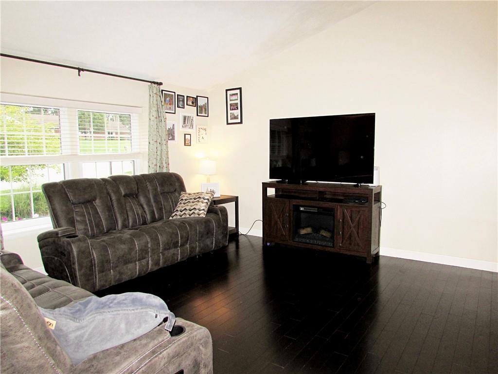 417 Rampart Boulevard New Kensington, PA 15068 - Photo 14 of 39 a living room with furniture and a flat screen tv