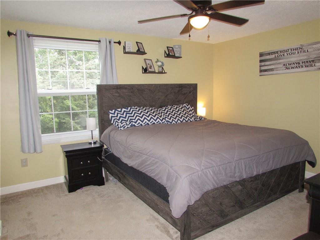 417 Rampart Boulevard New Kensington, PA 15068 - Photo 16 of 39 a bedroom with a bed and window