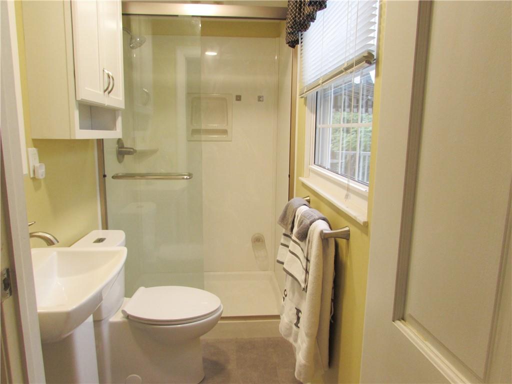 417 Rampart Boulevard New Kensington, PA 15068 - Photo 19 of 39 a bathroom with a toilet and shower