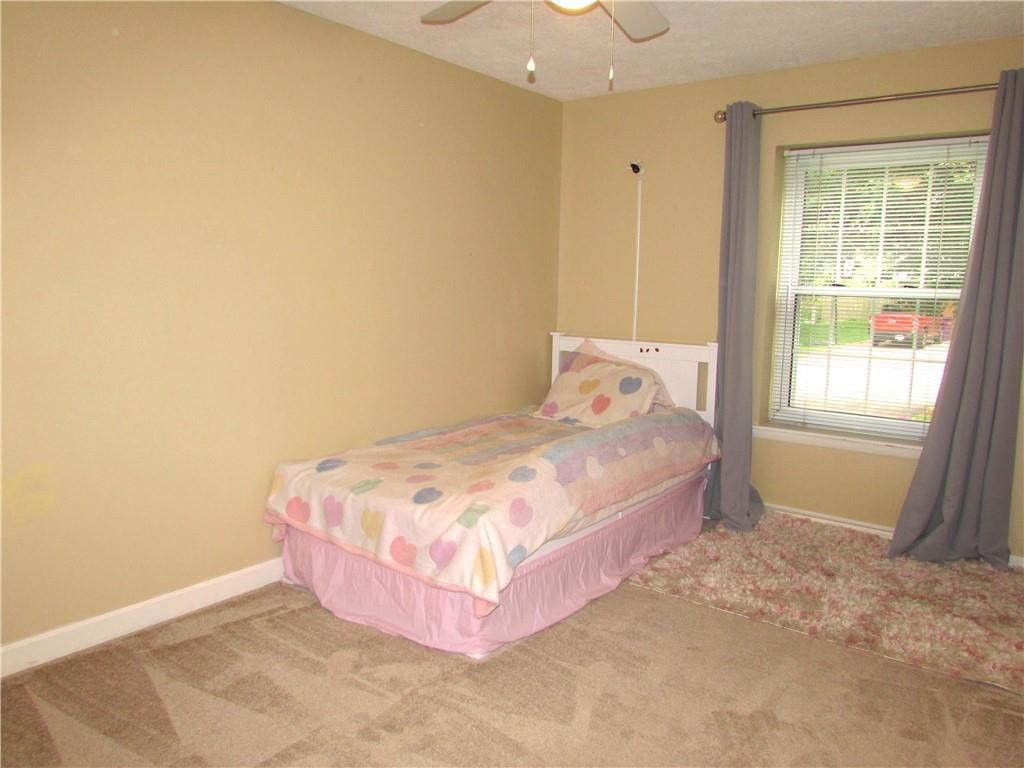417 Rampart Boulevard New Kensington, PA 15068 - Photo 22 of 39 a bedroom with a bed and a window