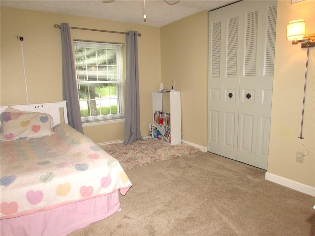 417 Rampart Boulevard New Kensington, PA 15068 - Photo 23 of 39 a bedroom with a bed and a window