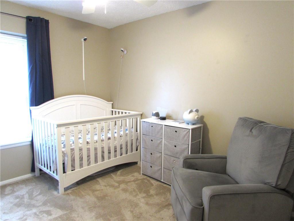 417 Rampart Boulevard New Kensington, PA 15068 - Photo 28 of 39 a room with furniture and baby crib