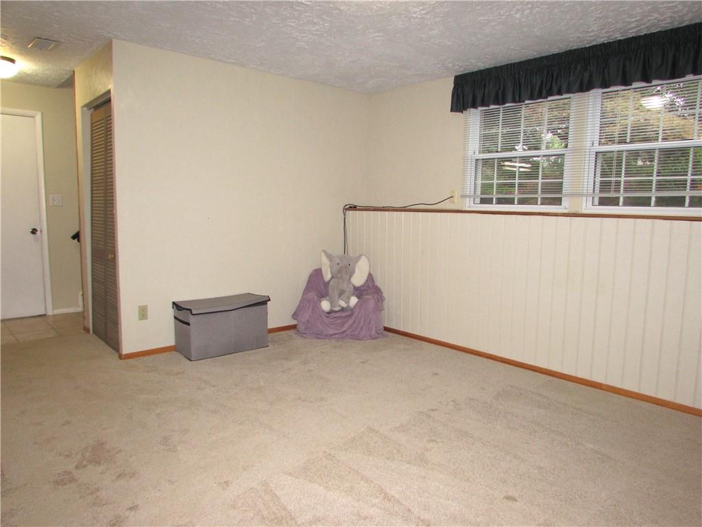 417 Rampart Boulevard New Kensington, PA 15068 - Photo 31 of 39 a room with a table and a chair