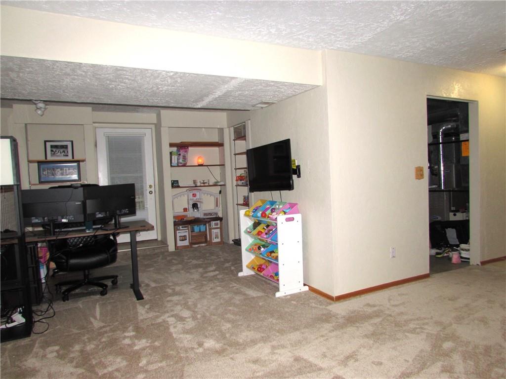 417 Rampart Boulevard New Kensington, PA 15068 - Photo 35 of 39 a view of a livingroom with furniture and workspace