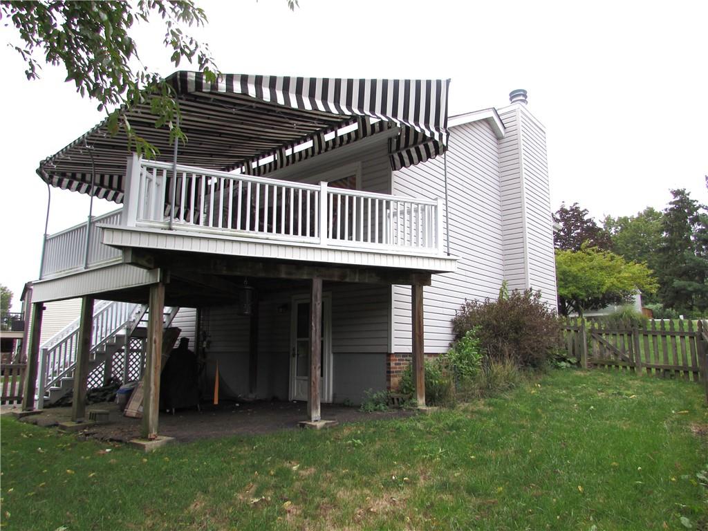 417 Rampart Boulevard New Kensington, PA 15068 - Photo 37 of 39 a view of a house with a yard and deck