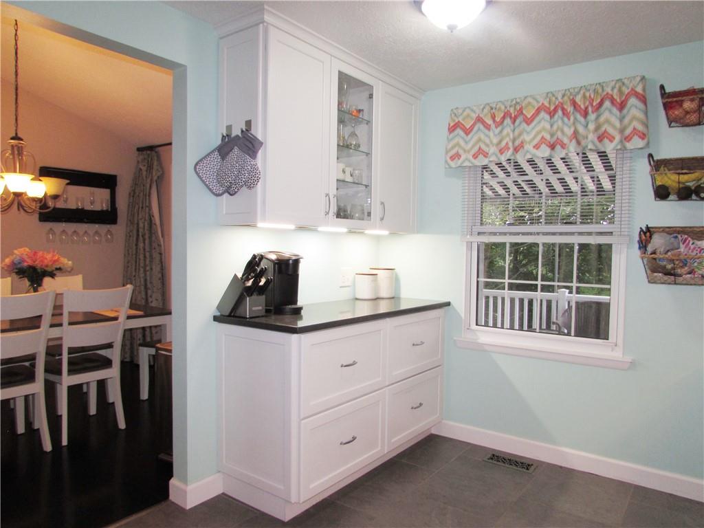 417 Rampart Boulevard New Kensington, PA 15068 - Photo 7 of 39 a kitchen with a sink and cabinets