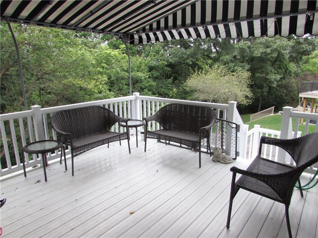417 Rampart Boulevard New Kensington, PA 15068 - Photo 10 of 39 a view of balcony with wooden floor outdoor seating and yard in back