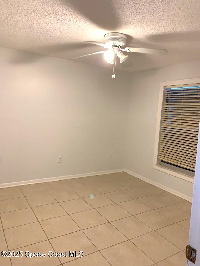 626 Fairhaven Street Northeast Palm Bay, FL 32907 - Photo 12 of 15 a view of a room with racks on the wall