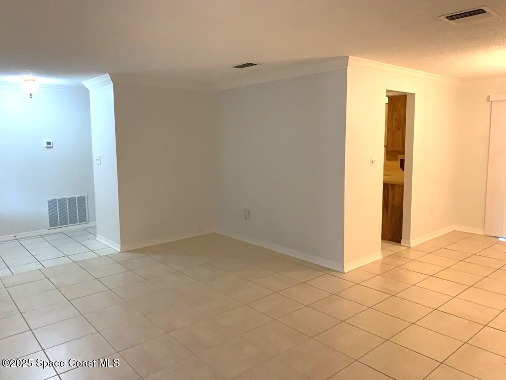 626 Fairhaven Street Northeast Palm Bay, FL 32907 - Photo 4 of 15 a view of an empty room