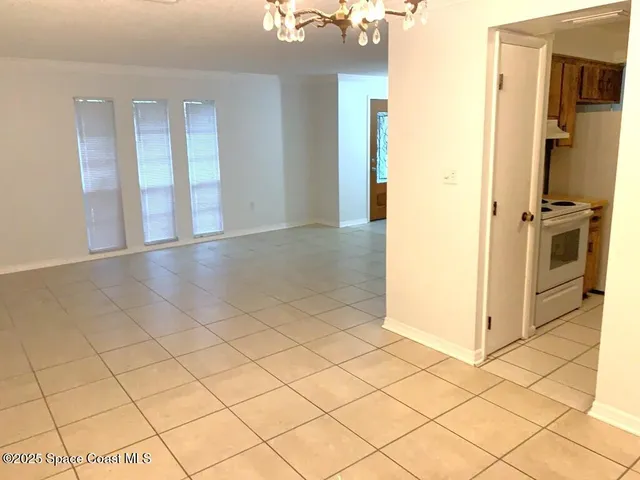a view of a room & utility room
