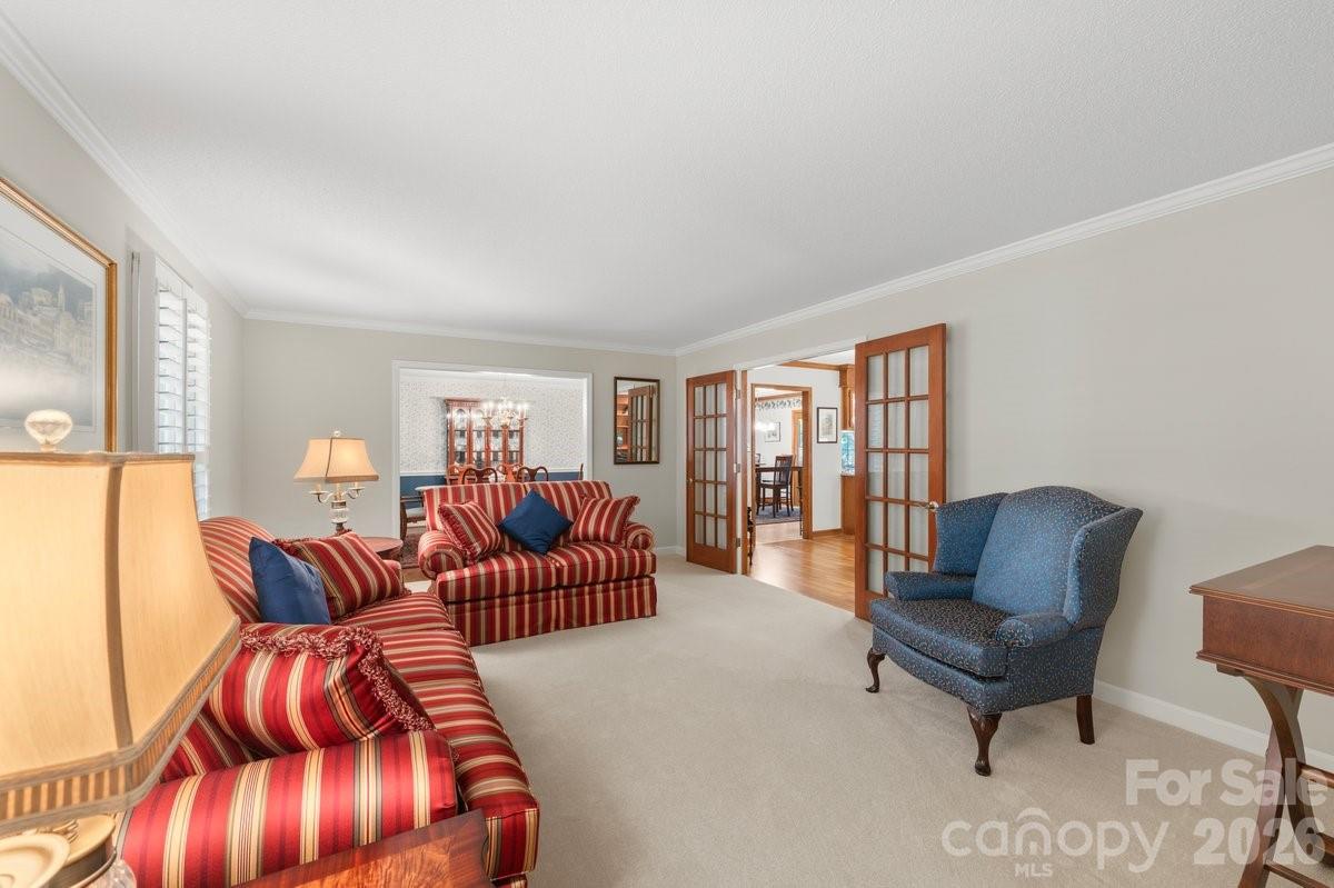 207 Lost Corner Road Morganton, NC 28655 - Photo 10 of 46 a living room with furniture and a large window