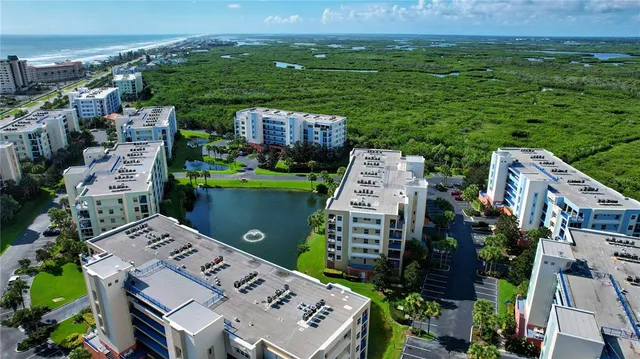 a view of city with tall buildings