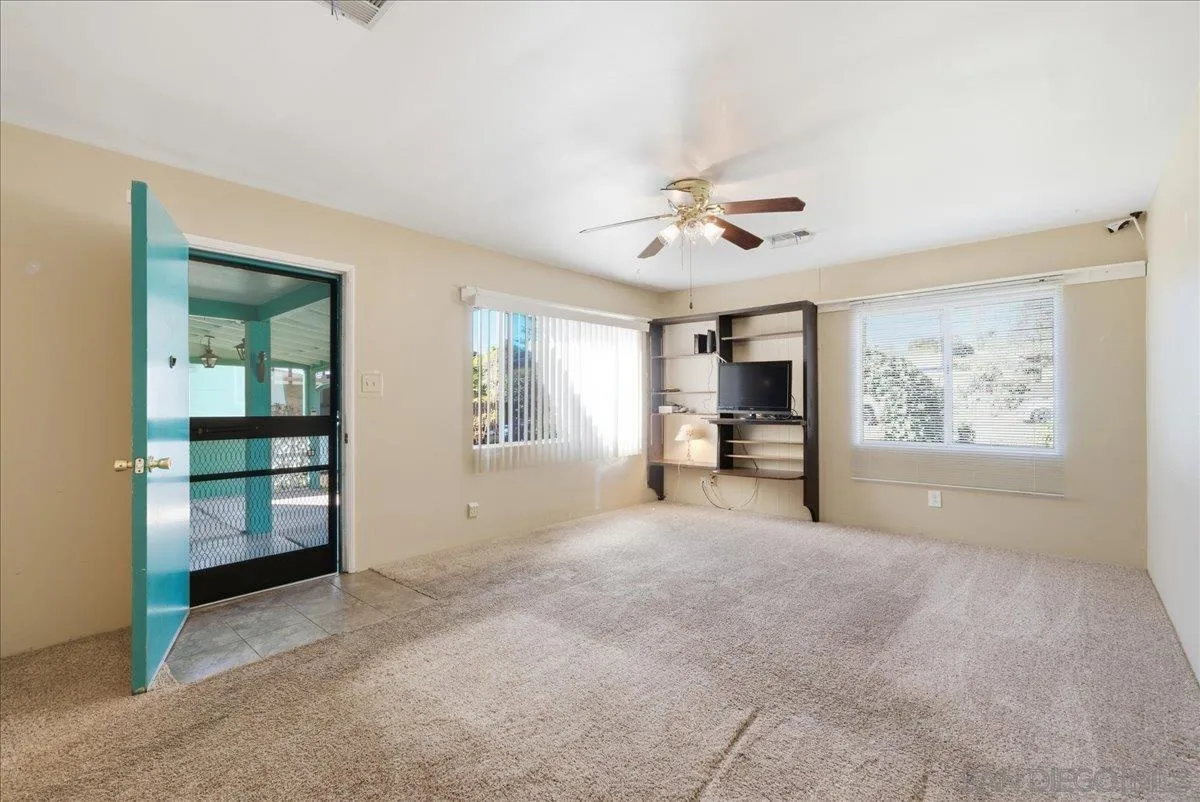 214 Summit Avenue Fallbrook, CA 92028 - Photo 16 of 43 wooden floor in an empty room with a window