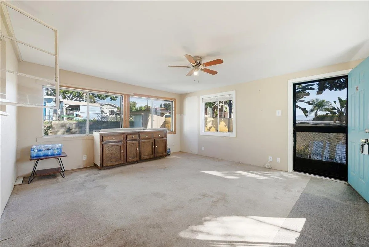 214 Summit Avenue Fallbrook, CA 92028 - Photo 18 of 43 a living room with furniture and a window
