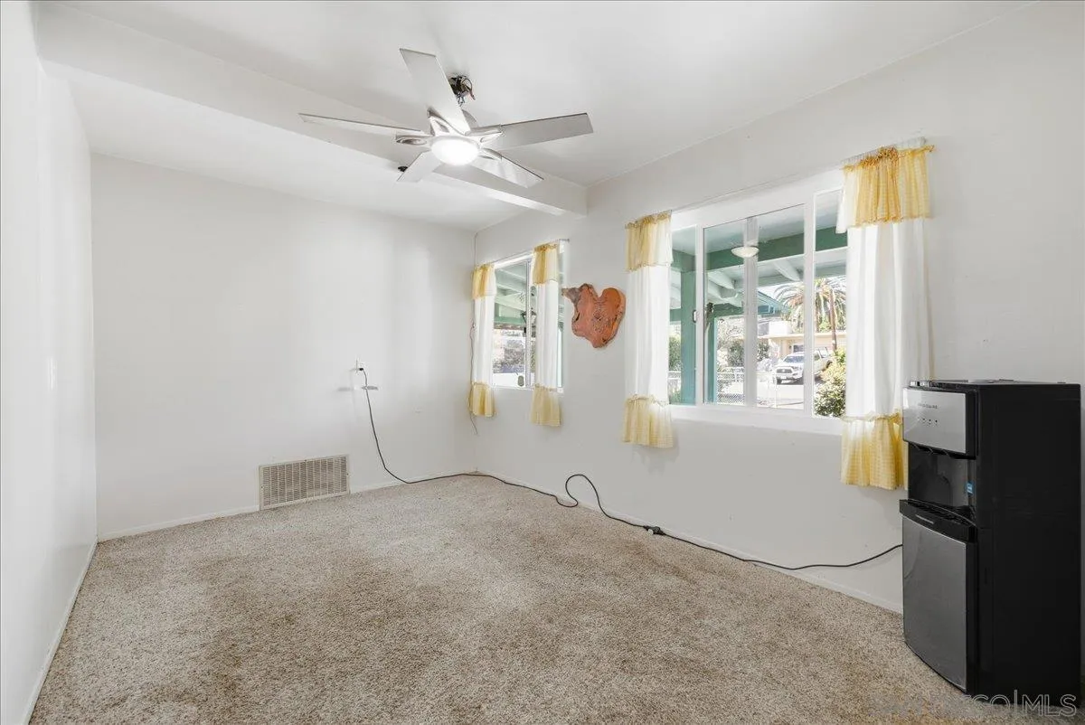 214 Summit Avenue Fallbrook, CA 92028 - Photo 19 of 43 a view of an empty room with a window