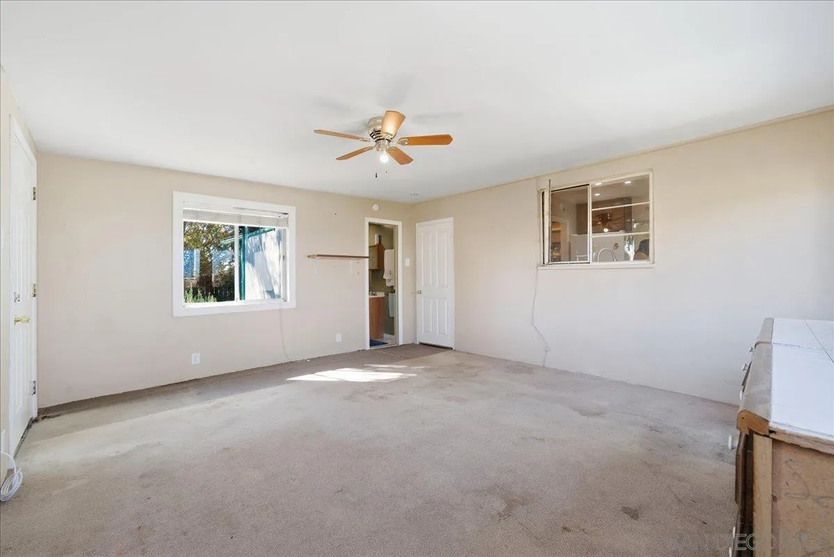 214 Summit Avenue Fallbrook, CA 92028 - Photo 23 of 43 a view of an empty room with a window