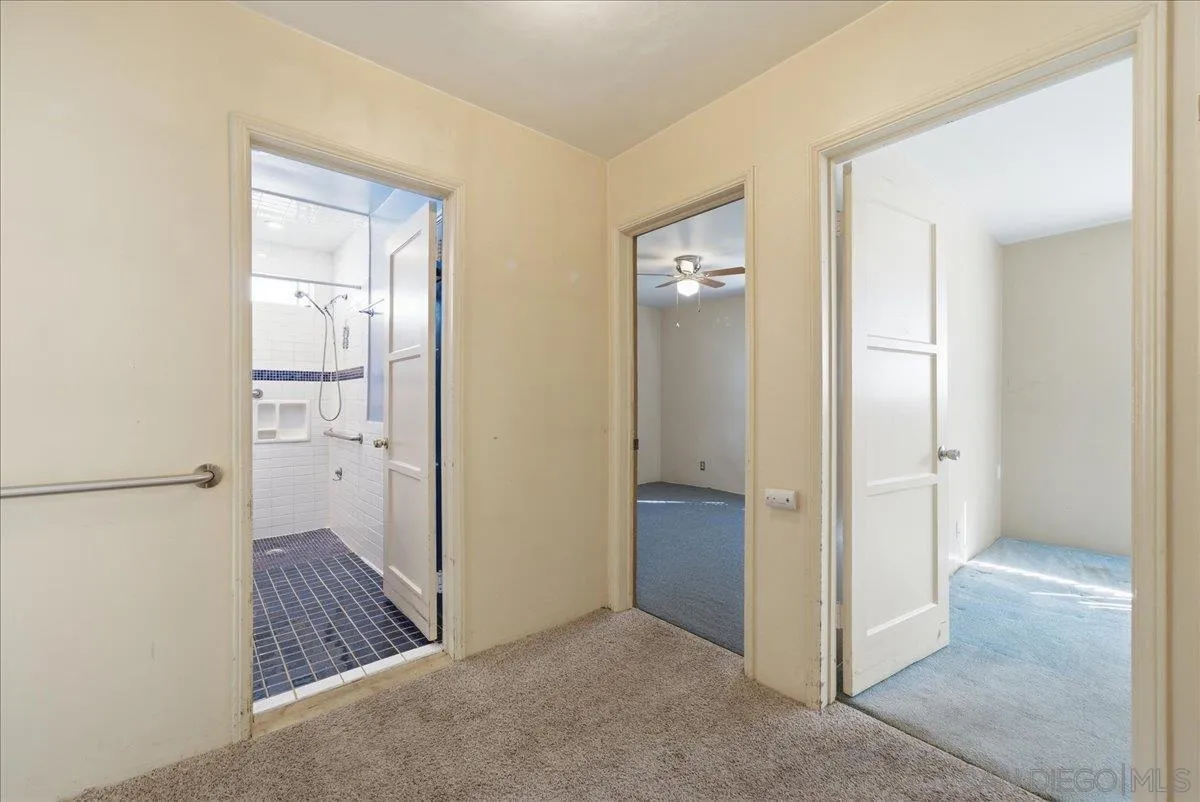 214 Summit Avenue Fallbrook, CA 92028 - Photo 27 of 43 a view of a hallway with an empty room