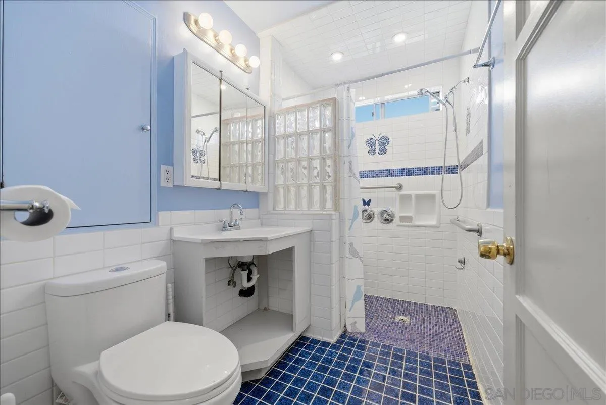 214 Summit Avenue Fallbrook, CA 92028 - Photo 36 of 43 a bathroom with a sink toilet and shower