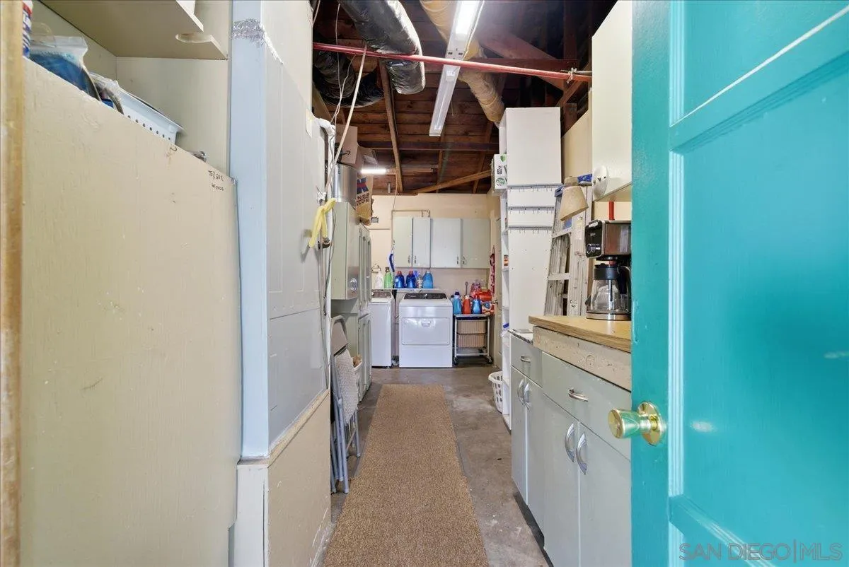 214 Summit Avenue Fallbrook, CA 92028 - Photo 38 of 43 a view of walk in closet with clothes and shoes