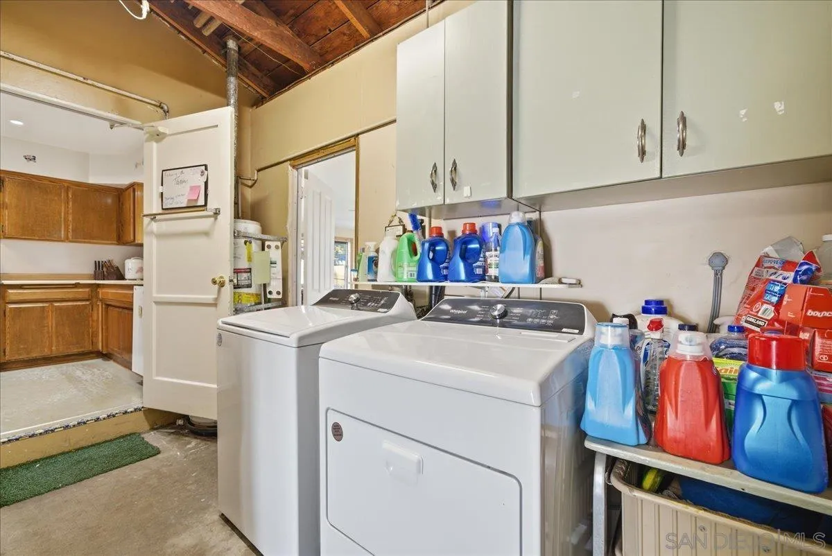 214 Summit Avenue Fallbrook, CA 92028 - Photo 39 of 43 a utility room with dryer and washer