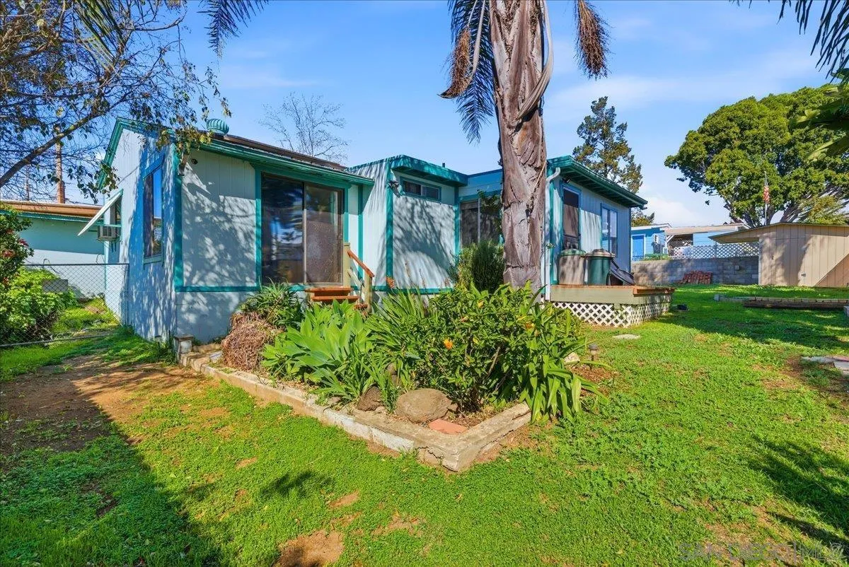 214 Summit Avenue Fallbrook, CA 92028 - Photo 42 of 43 a front view of a house with garden