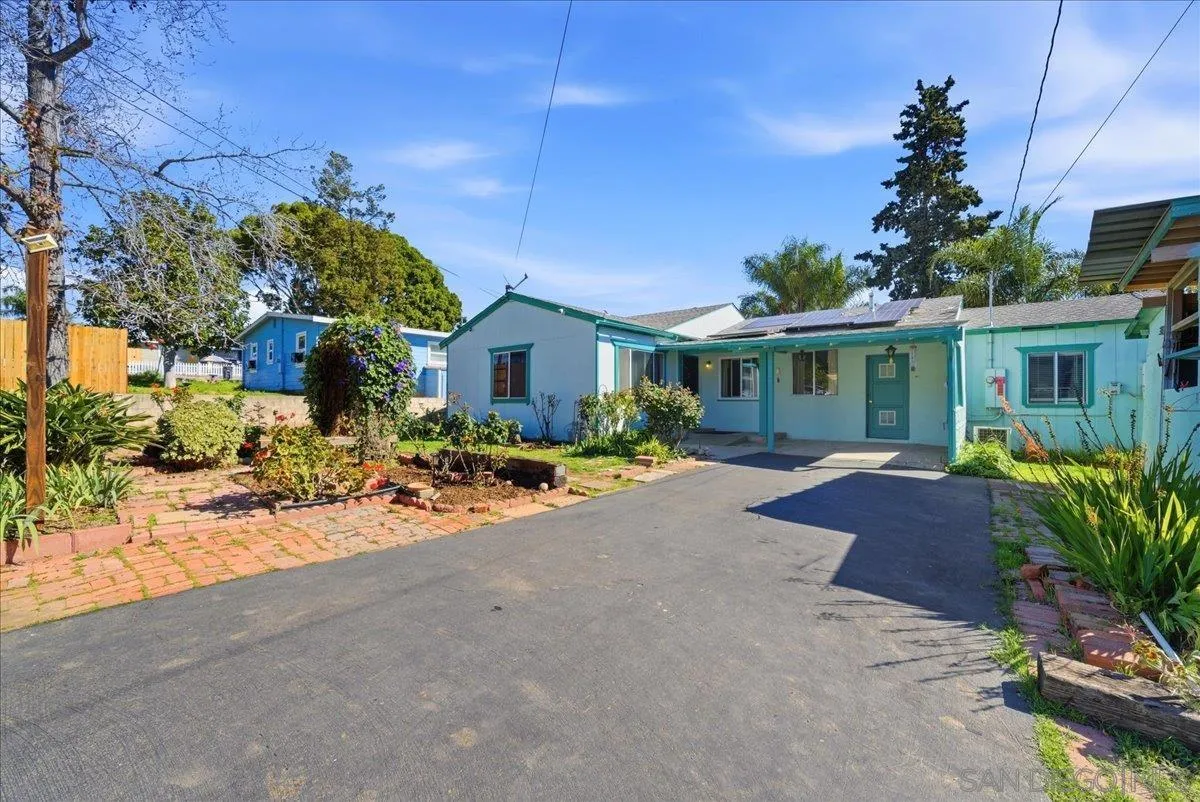 214 Summit Avenue Fallbrook, CA 92028 - Photo 8 of 43 a view of a house with sitting area and potted plants