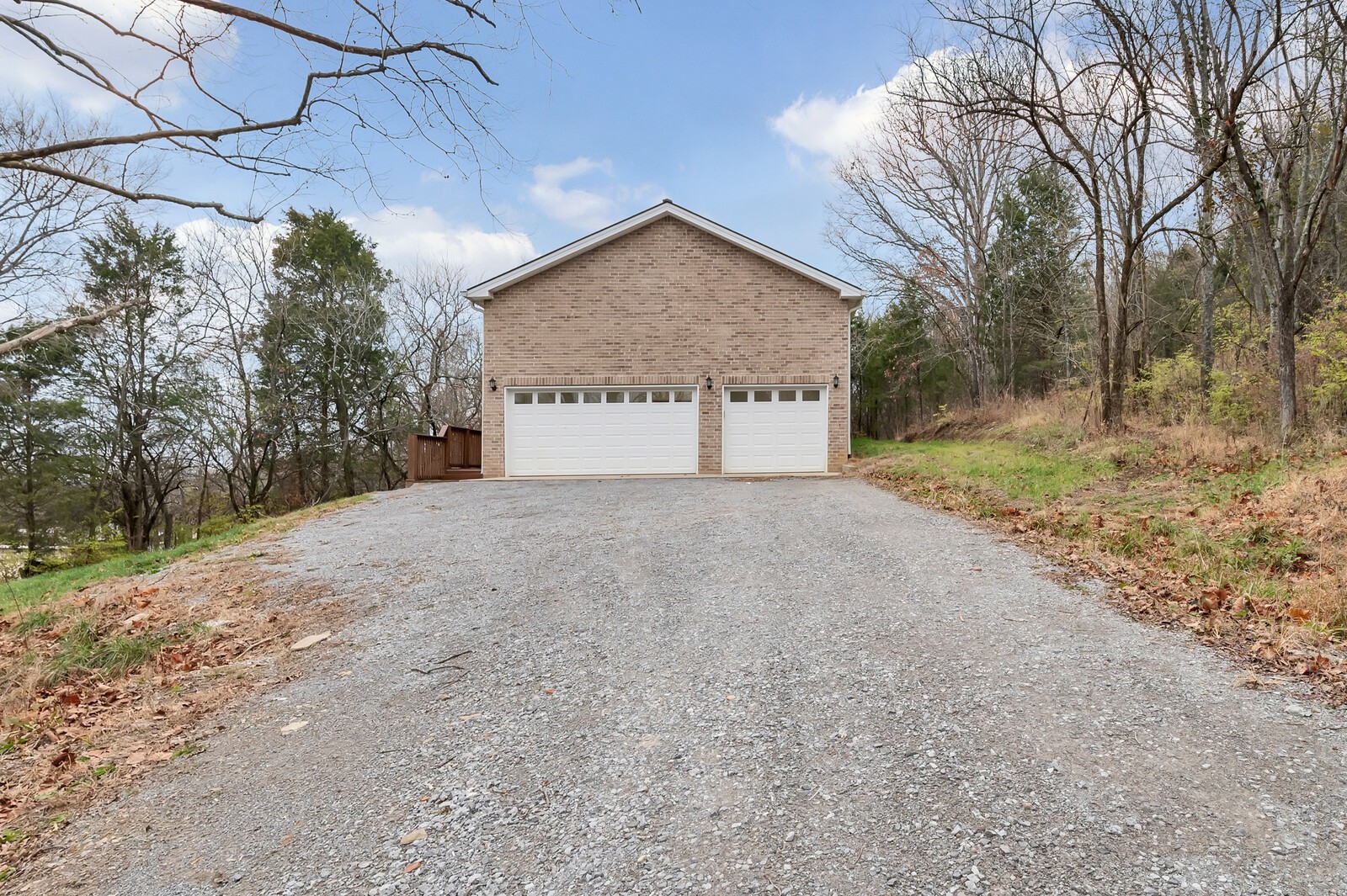105 Lake Wood Road Lebanon, TN 37087 - Photo 34 of 34 a view of large house with a yard and large tree