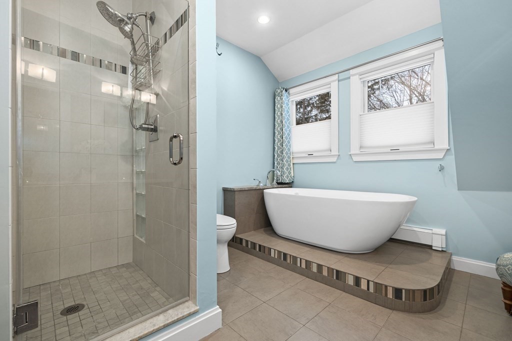 10 Grapevine Road Wenham, MA 01984 - Photo 23 of 42 a bathroom with a bathtub and shower