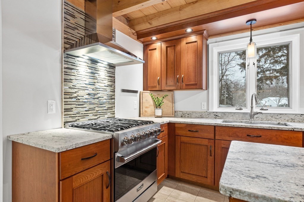 10 Grapevine Road Wenham, MA 01984 - Photo 9 of 42 a kitchen that has a sink and a stove