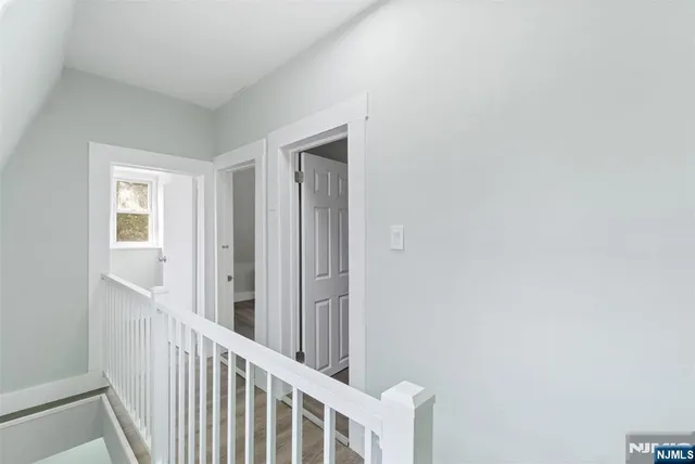 a view of a livingroom with wooden floor