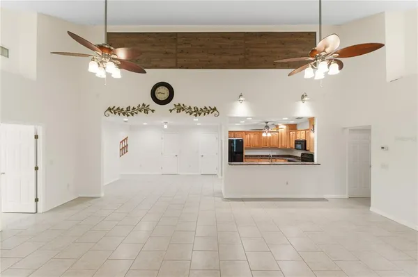 a kitchen with stainless steel appliances granite countertop a sink a stove and a granite counter tops