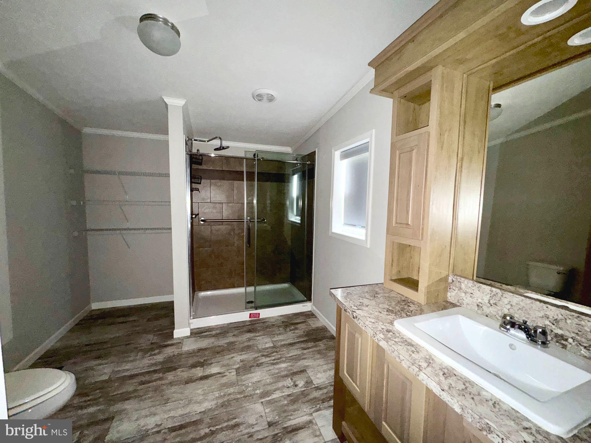 38 Groff Farm Road Conowingo, MD 21918 - Photo 11 of 30 a bathroom with a sink and a mirror