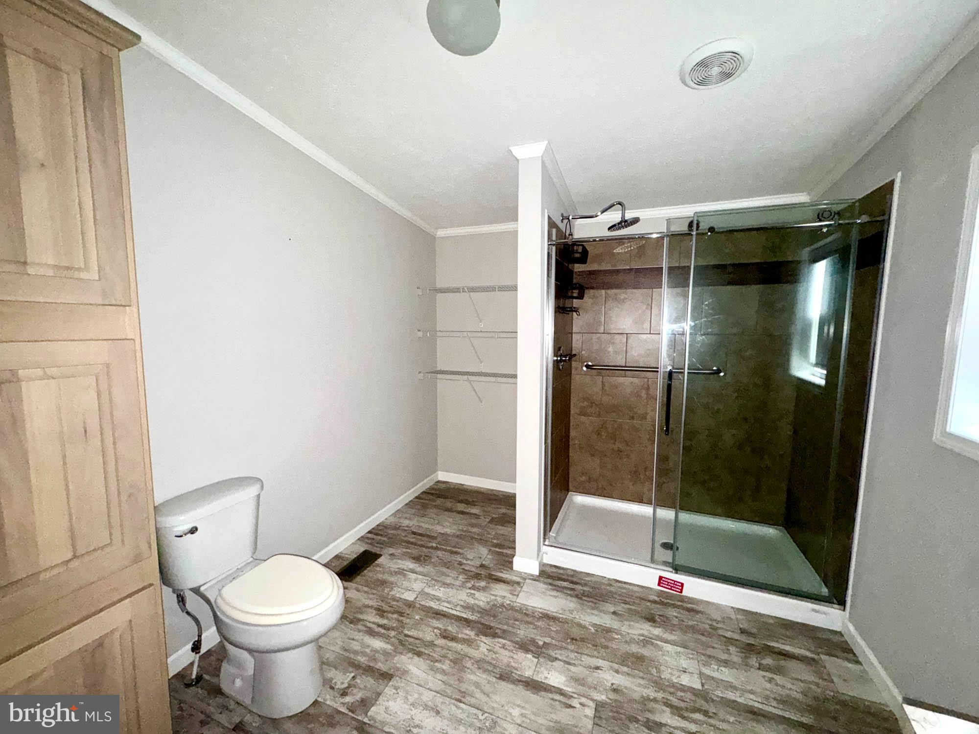 38 Groff Farm Road Conowingo, MD 21918 - Photo 12 of 30 a bathroom with a shower and toilet