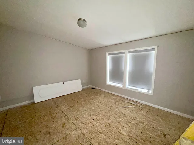 an empty room with a workbench