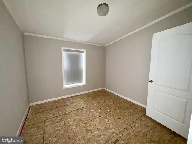 an empty room with a natural light