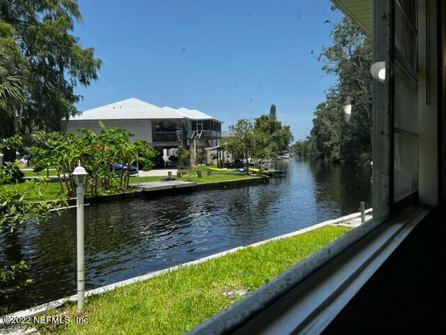 7222 Tropical Drive Weeki Wachee, FL 34607 - Photo 13 of 26 a view of a lake from a balcony